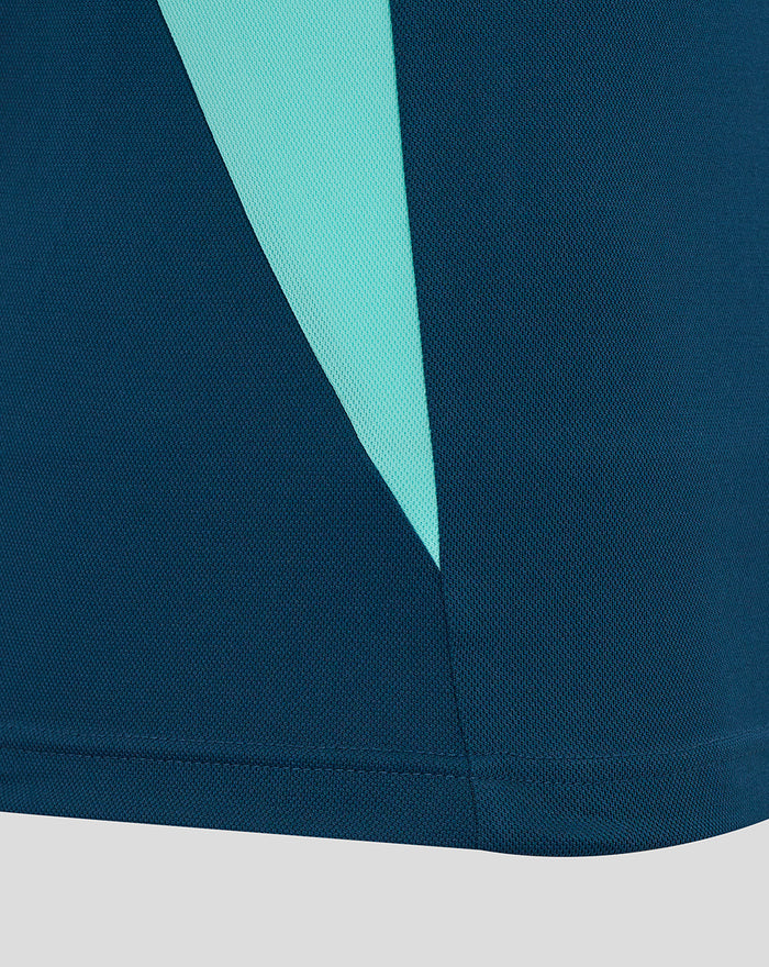 Close up of teal navy fabric from Athletic Club presentation poly polo with a bright turquoise diagonal stripe
