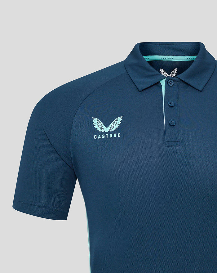 Close up view of navy blue Athletic Club poly polo showing left chest crest and shoulder seam