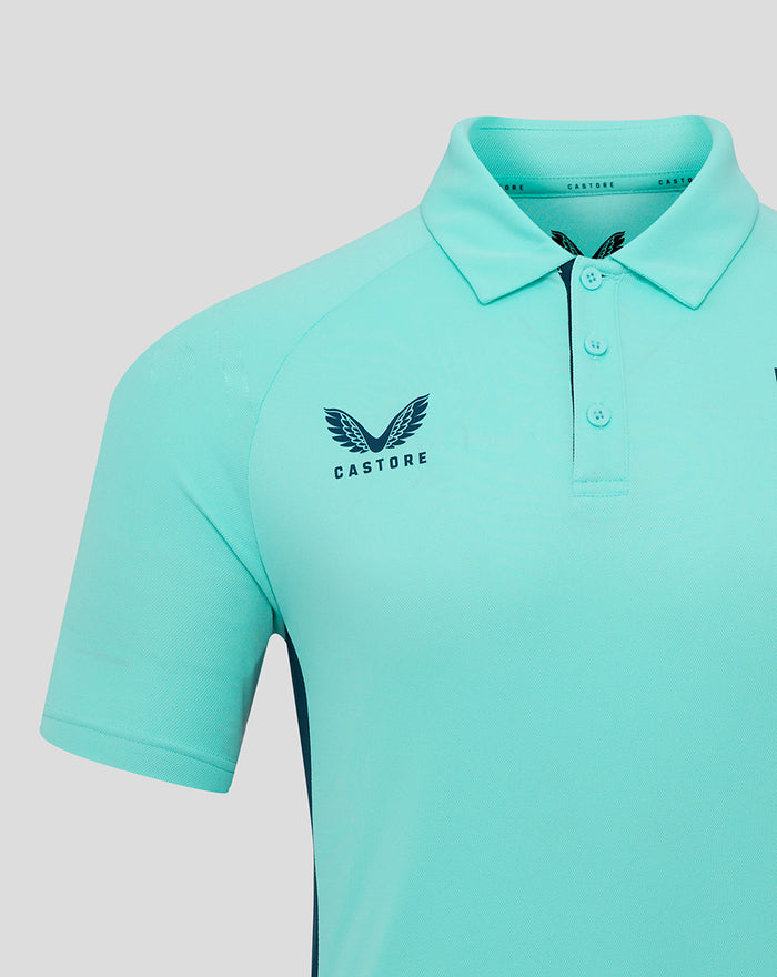 Turquoise athletic club presentation polo shirt with winged Castore logo on the chest.