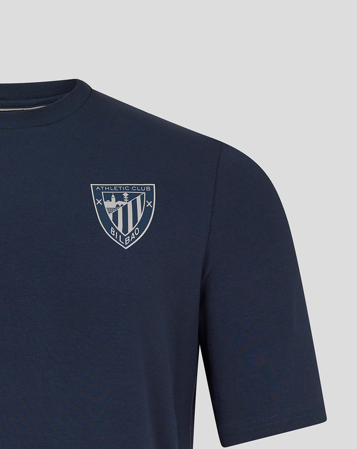 Close up of left chest crest on navy Athletic Club Travel tee.