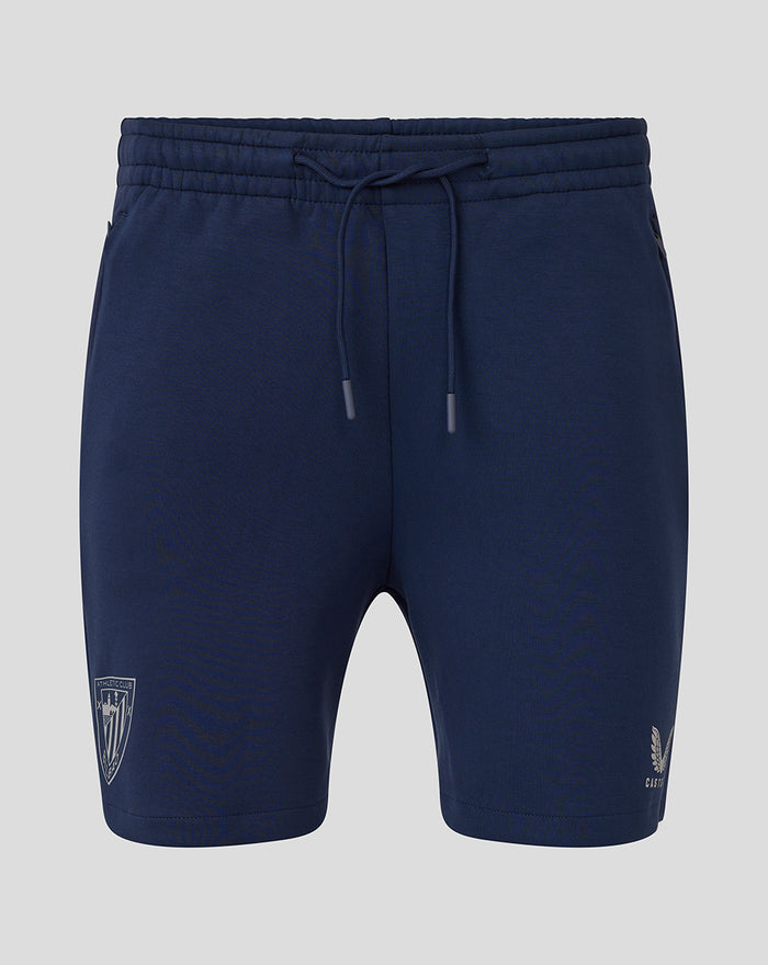 Navy Athletic Club Travel Knit Shorts with a drawstring waistband and crest logo on the left leg.