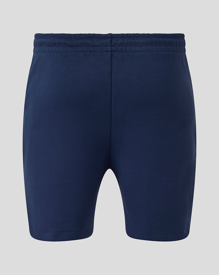 Back view of navy athletic club travel knit shorts with an elastic waistband