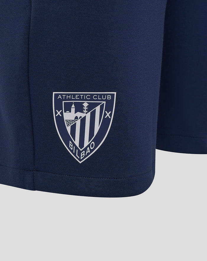 Athletic Club crest logo printed on navy fabric near the hem.