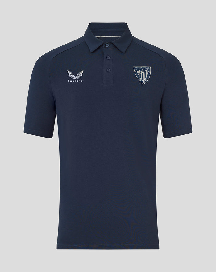 Front view of navy athletic club travel short sleeve polo with crest emblem on the chest