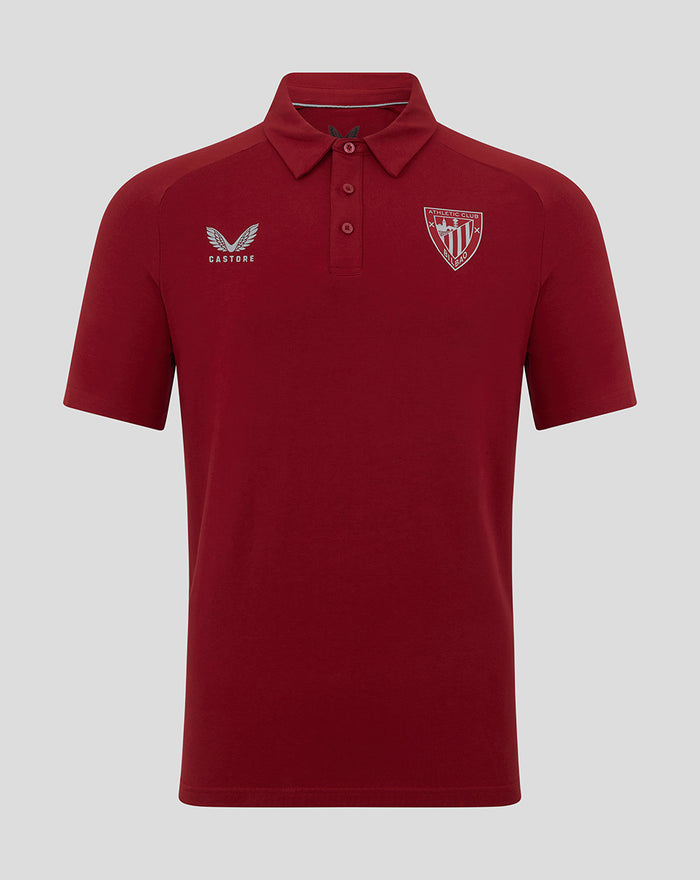 Red Athletic Club travel polo shirt with crest badge on the chest and Castore logo on the other side.