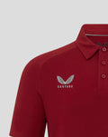 Close up of the polo chest showing the Castore logo with wings.