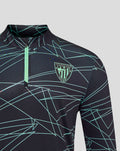 Chest and shoulder view of Athletic Club 3rd pre match midlayer top with teal geometric pattern and crest badge