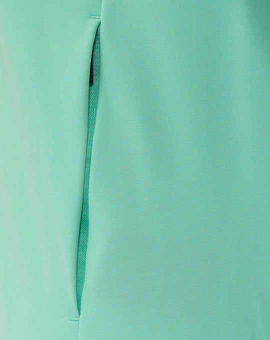 Close up of mint green fabric showing a zippered placket on the Athletic Club jacket