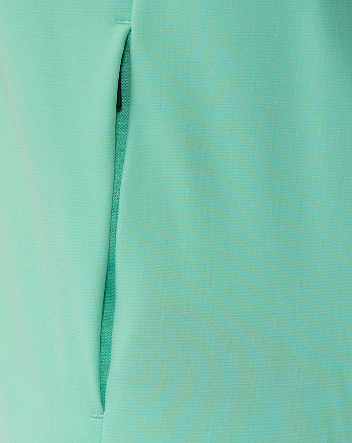 Close up of mint green fabric showing a zippered placket on the Athletic Club jacket