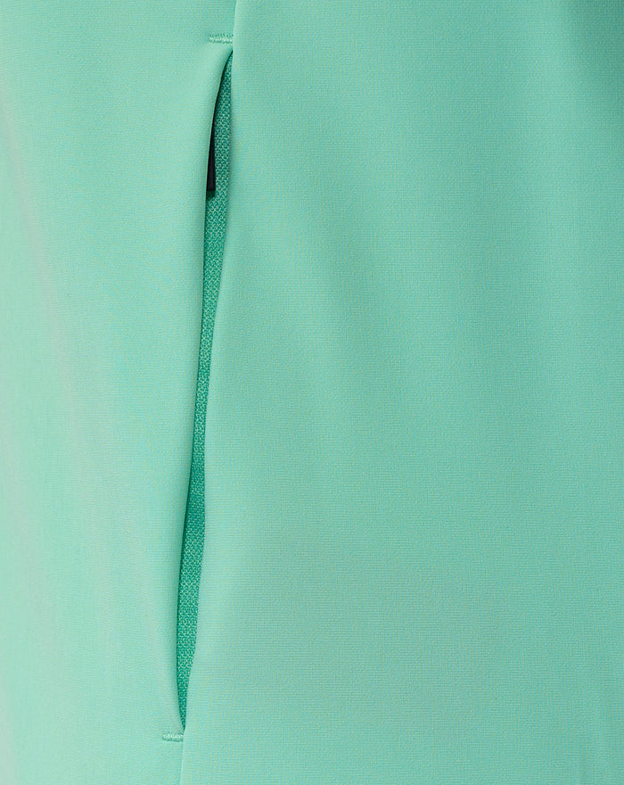 Close up of mint green fabric showing a zippered placket on the Athletic Club jacket