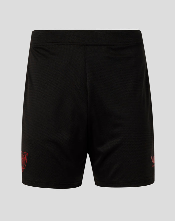 Back view of black textured junior shorts with a red Athletic Club crest patch on the leg