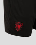Back view of black shorts with a red Athletic Club crest on the left leg.
