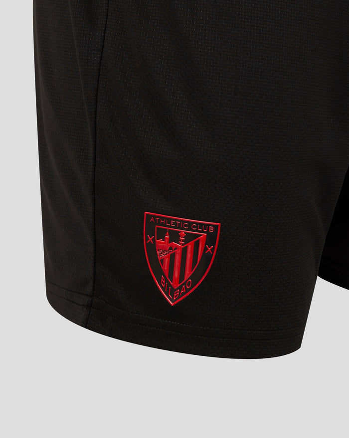 Back view of black athletic shorts for juniors with a red Athletic Club Bilbao crest on the leg