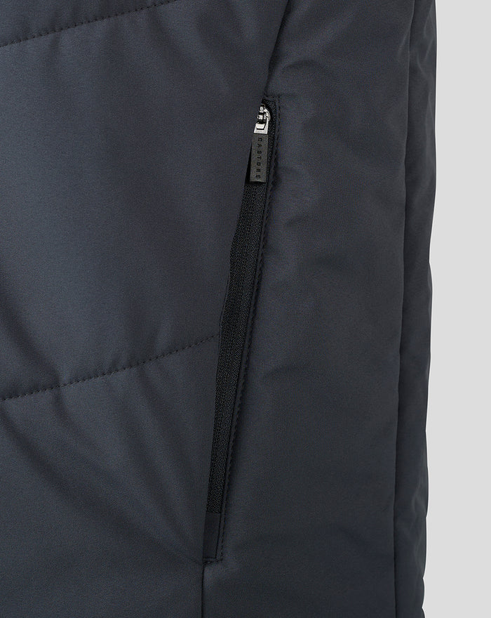 Close up of a vertical zipped side pocket on the Men’s Coaches Training Bench Gilet.