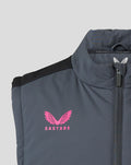 Close-up of collar and left chest with pink crest and zip on the gilet.