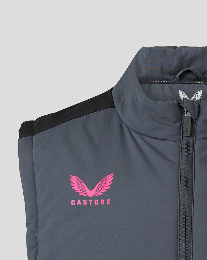Close-up of collar and left chest with pink crest and zip on the gilet.