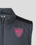 Close-up of chest area showing gray fabric, pink club crest, and zip detail on the gilet.