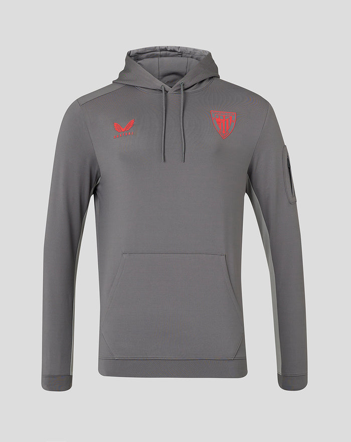 Grey junior 1/4 zip hooded mid layer with red Athletic Club Bilbao crest on left chest and Castore logo on the right, front view