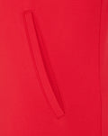 Close up of red Athletic Club Bilbao mid layer fabric with a stitched pocket