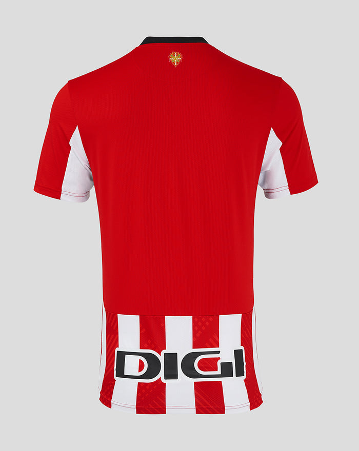 Back view of red home jersey with white lower stripes and large DIGI sponsor across the hem