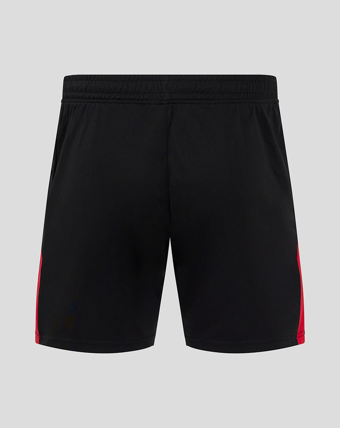 Back view of black athletic club shorts with an elastic waistband and red side panels.