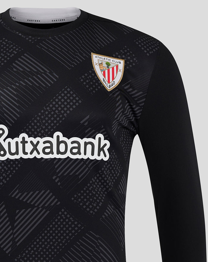 Close-up of the jersey chest highlighting the Athletic Club crest and dark geometric pattern.