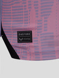 Close up of pink purple patterned fabric on the jersey with a Castore patch and geometric grid design