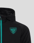 Close up of the teal Athletic Club Bilbao crest on the chest of the black jacket with turquoise zipper.