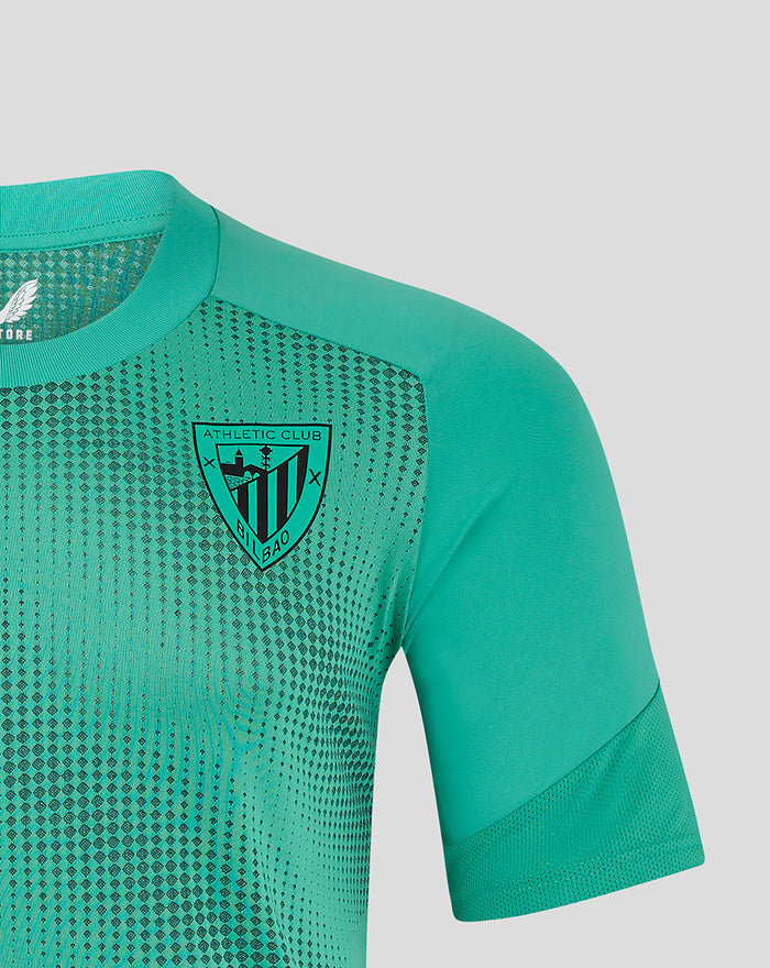 Teal Elite Players training short sleeve drill tee with a dotted pattern and club crest on the chest