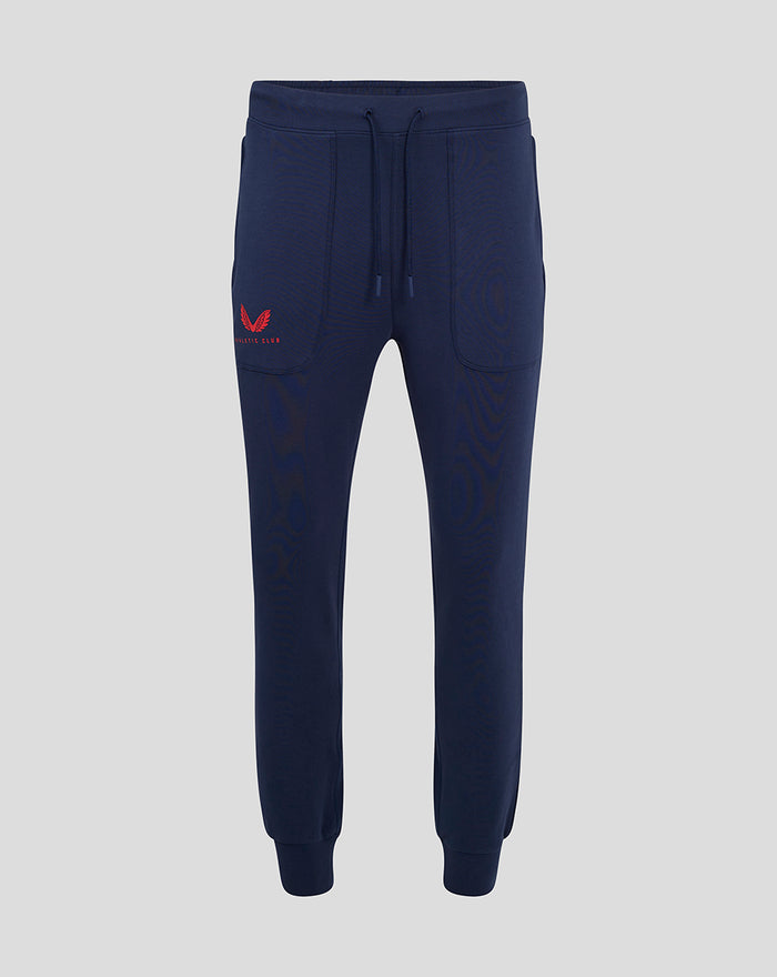 Front view of navy travel pants with external drawcords and a red Athletic Club logo on the left thigh
