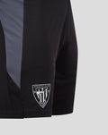 Close-up of GK training shorts in black with a gray blue side panel and Athletic Club Bilbao crest on the leg.
