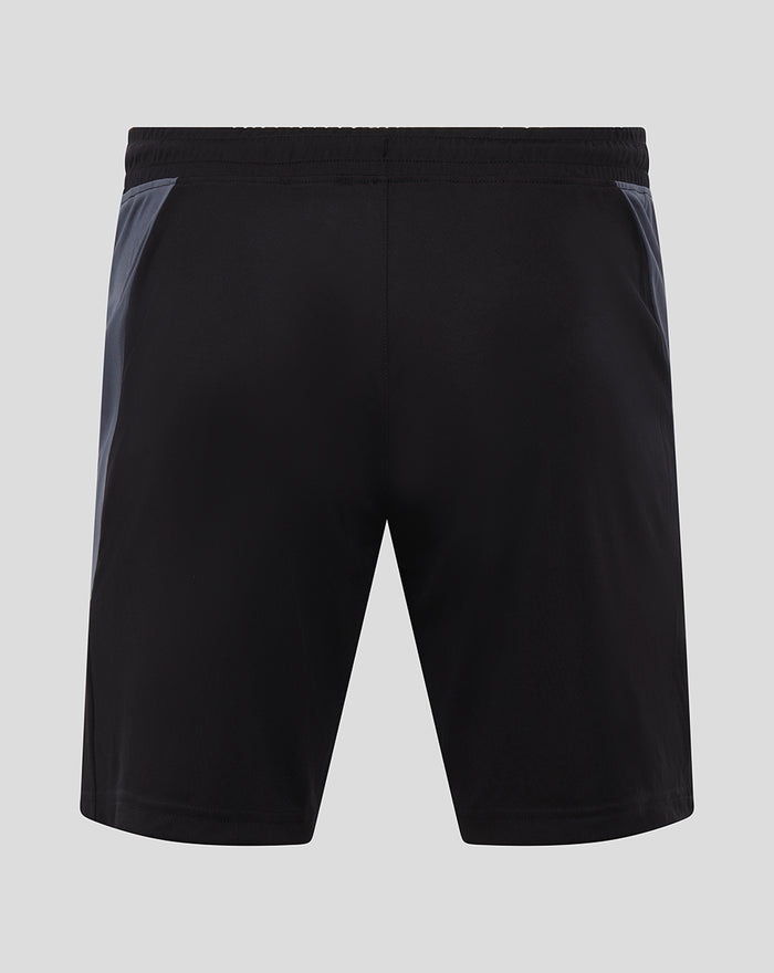 Back view of black GK training shorts with elastic waistband and gray side panels.