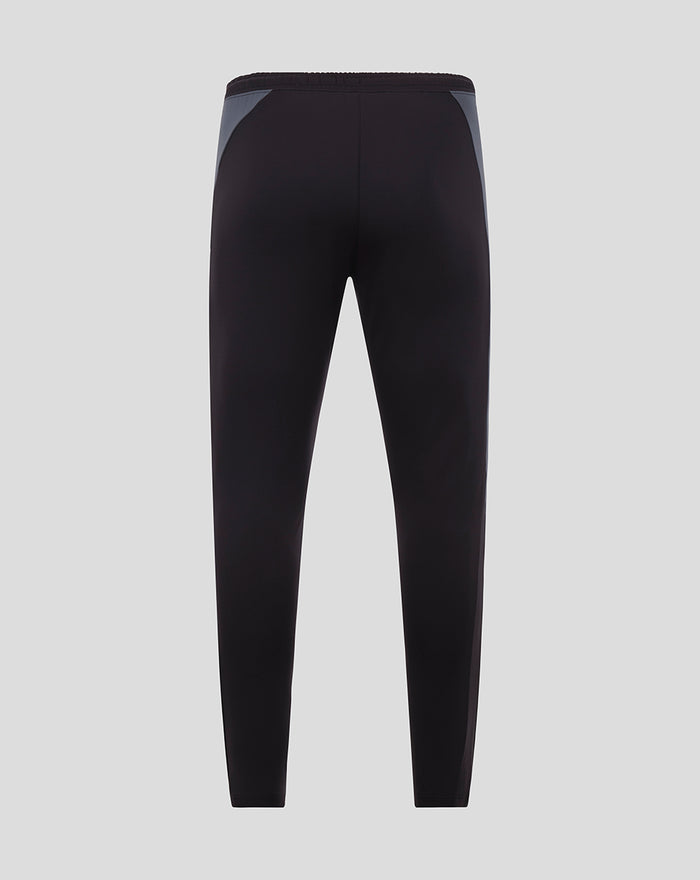 Black GK training pants with gray side panels and Castore branding