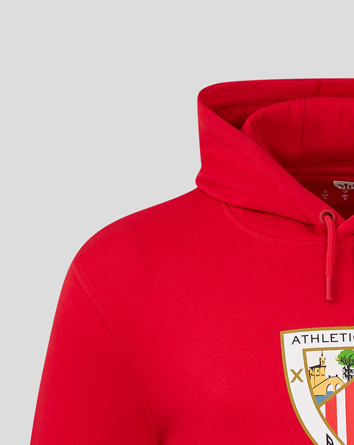 Red men's core hoodie close up showing hood and chest crest patch