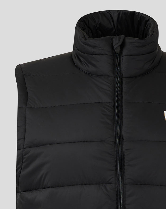 High collar and central zip with horizontal quilting on the black core gilet