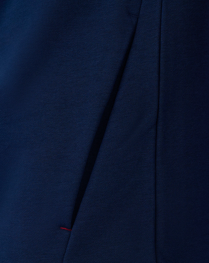 Close up of navy fleece fabric and seam detail on the athletic club full zip jacket
