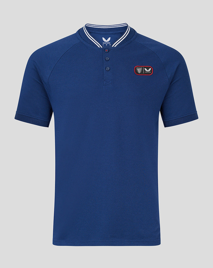 Blue Athletic Club cotton polo shirt front view with striped collar and left chest badge.