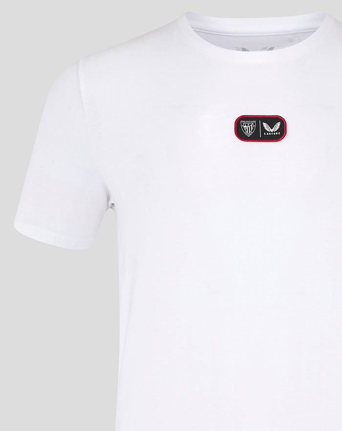 White T shirt with a red bordered chest patch logo on the left chest.