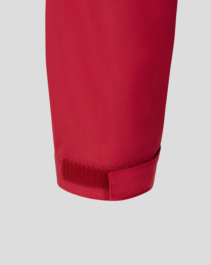 Red jacket sleeve cuff with Velcro closure strap