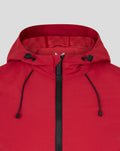 Close up of red athletic club anorak hood with black drawstrings and front zipper