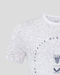 Close up of front design on grey and white Athletic Club Cotton Tee showing crest and arched text