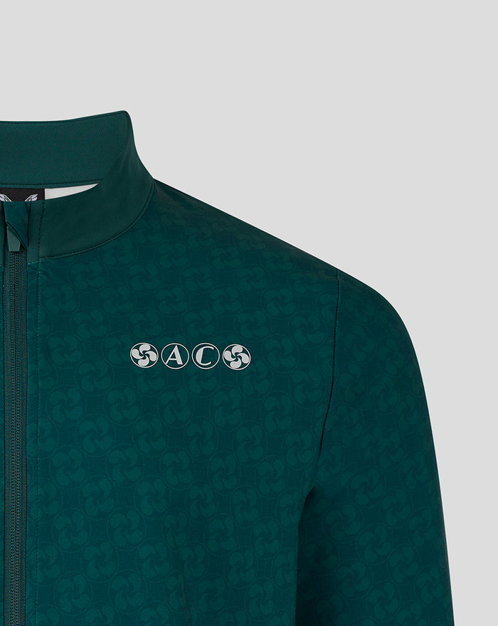 Close up of shoulder and chest area on green travel track jacket showing pattern and SAC logo