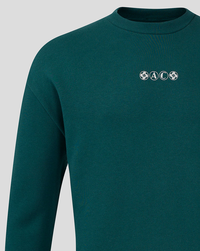 Chest area shows a small CASTORE logo with four circular emblems on teal fabric.