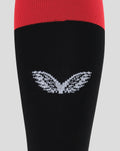 Athletic Club Fourth sock close-up showing red upper and black body with a white knit winged emblem.