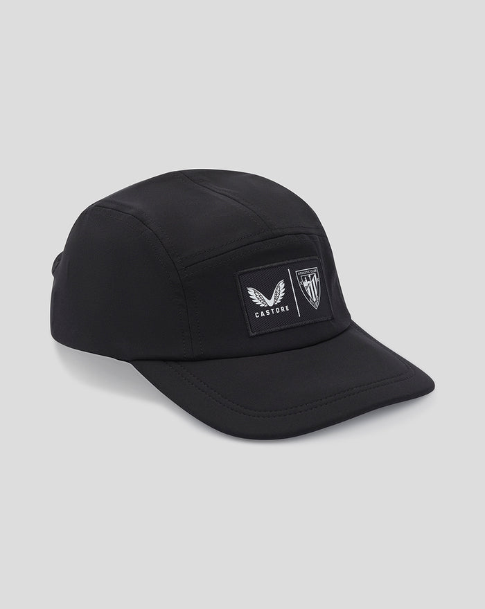 Black Club Cap Dual Castore with front patches showing a winged emblem and a shield crest