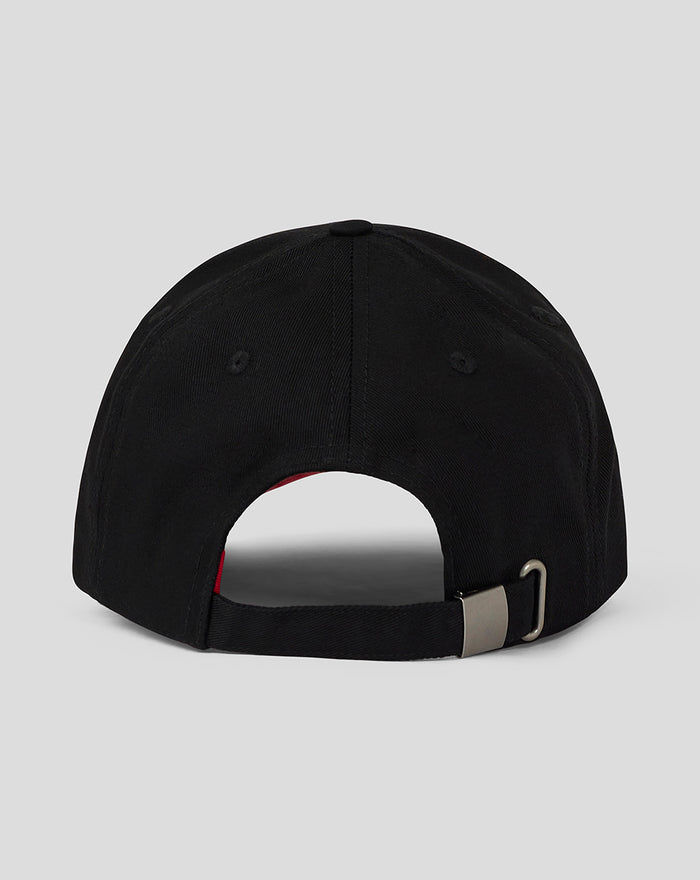 Back view of black cap with adjustable strap and metal buckle