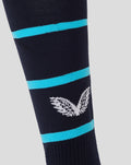 Close up of navy sock with turquoise stripes and white wing logo on the calf