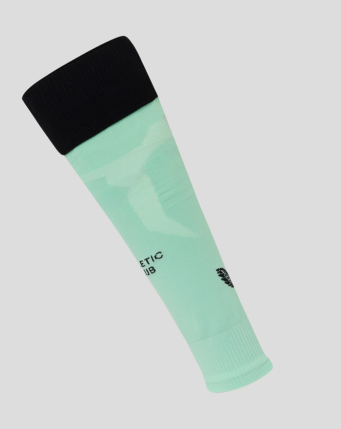 Mint green footless Athletic Club sock with black cuff and branding along calf and shin