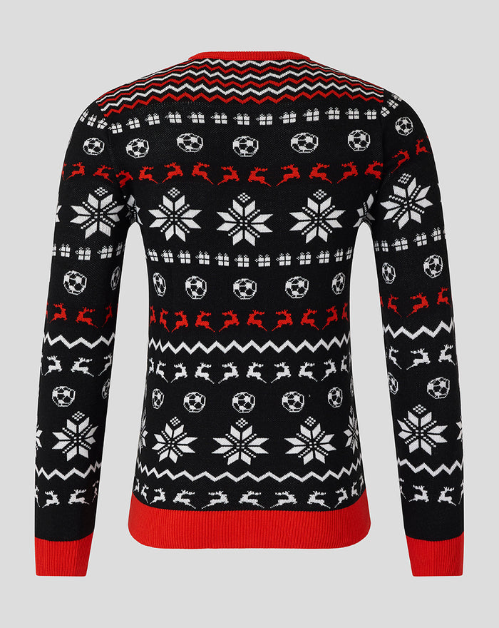 Back view of Athletic Club Christmas jumper in black with white snowflakes soccer balls and red trim along the collar and hem