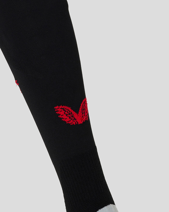 Black Athletic Club fourth kit junior sock with red embroidered wing emblem near the ankle.